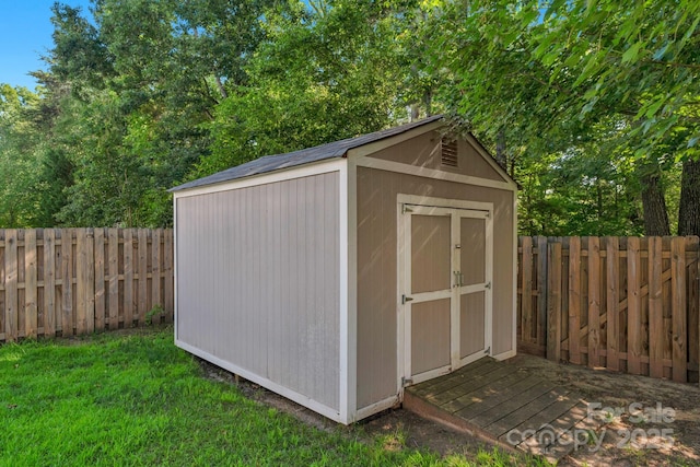 8325 Burgundy Ridge Dr, Harrisburg, NC 28075 - view of shed with a fenced backyard
