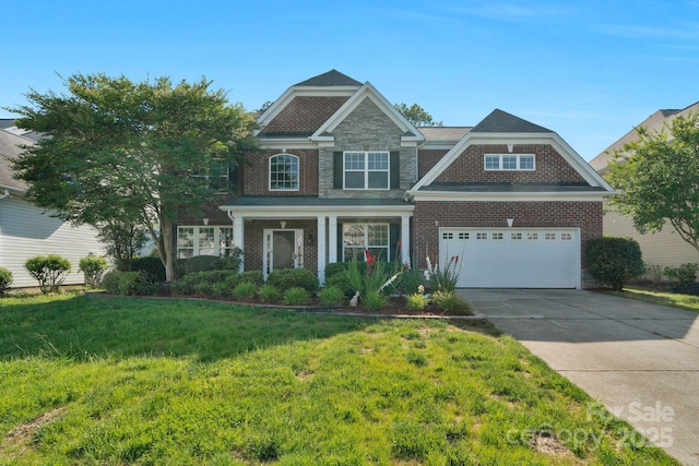 8325 Burgundy Ridge Dr, Harrisburg, NC 28075 - view of front facade featuring driveway, a front yard, brick siding, and an attached garage