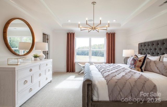 1041 Waxhaw Crossing Dr Unit 058, Waxhaw, NC 28173 - bedroom with a chandelier, a tray ceiling, light colored carpet, recessed lighting, and ornamental molding
