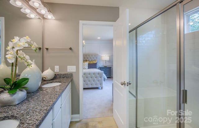 1041 Waxhaw Crossing Dr Unit 058, Waxhaw, NC 28173 - ensuite bathroom with double vanity and a stall shower
