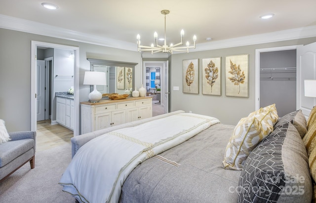 1041 Waxhaw Crossing Dr Unit 058, Waxhaw, NC 28173 - bedroom with a chandelier, crown molding, a spacious closet, recessed lighting, and a closet
