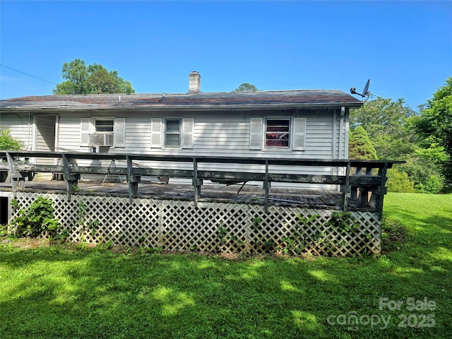 1206 Three Way Ln, Lenoir, NC 28645 - rear view of house with a deck, a lawn, a chimney, and cooling unit
