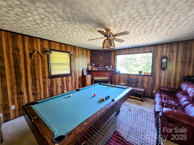 1206 Three Way Ln, Lenoir, NC 28645 - recreation room featuring a textured ceiling, pool table, wooden walls, a ceiling fan, and carpet floors