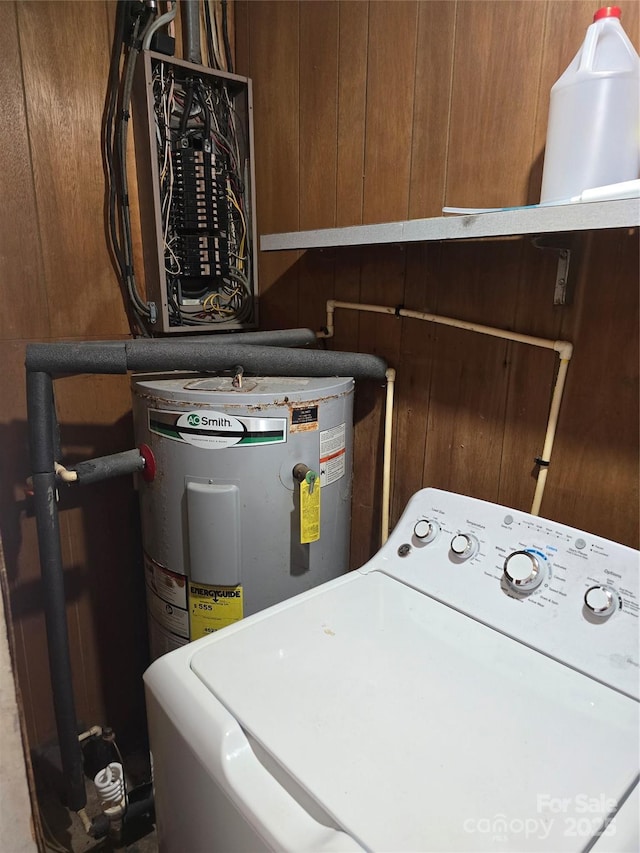 1206 Three Way Ln, Lenoir, NC 28645 - washroom with washer / dryer, water heater, and wood walls