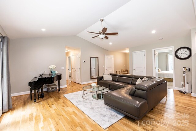1005 8th Ave SW, Conover, NC 28613 - living room with a ceiling fan, light wood finished floors, vaulted ceiling, and recessed lighting