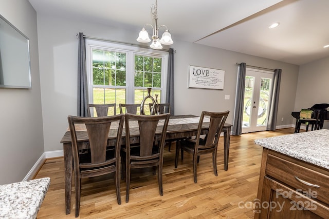 1005 8th Ave SW, Conover, NC 28613 - dining area with a chandelier, light wood-style floors, and recessed lighting