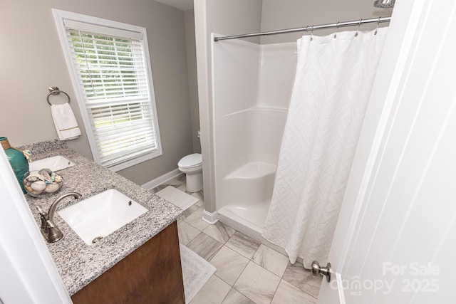 1005 8th Ave SW, Conover, NC 28613 - bathroom featuring double vanity and a shower with shower curtain