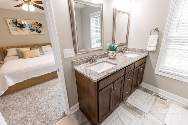 1005 8th Ave SW, Conover, NC 28613 - full bath with double vanity, ceiling fan, and ensuite bath