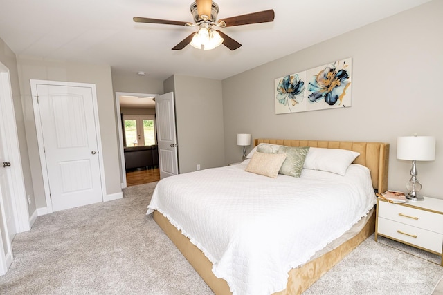 1005 8th Ave SW, Conover, NC 28613 - bedroom featuring light carpet and a ceiling fan