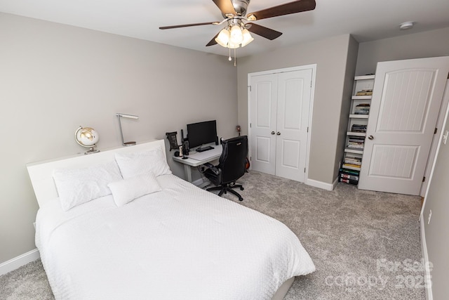 1005 8th Ave SW, Conover, NC 28613 - bedroom with carpet floors, a closet, a ceiling fan, and a desk