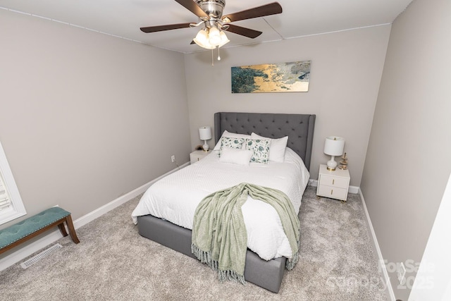 1005 8th Ave SW, Conover, NC 28613 - carpeted bedroom with baseboards and ceiling fan