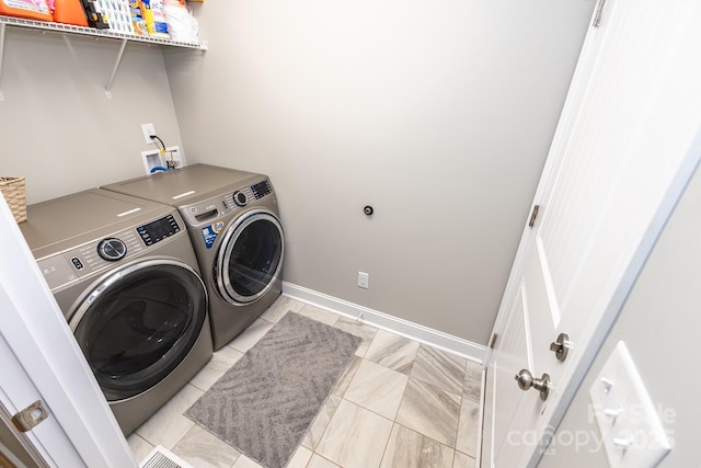 1005 8th Ave SW, Conover, NC 28613 - laundry area featuring separate washer and dryer and baseboards