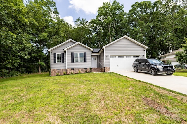 1005 8th Ave SW, Conover, NC 28613 - ranch-style home featuring crawl space, concrete driveway, an attached garage, a front lawn, and view of wooded area