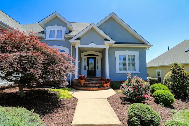 406 Spyglass Hill Pl, Salisbury, NC 28144 - view of front facade with stucco siding and a shingled roof
