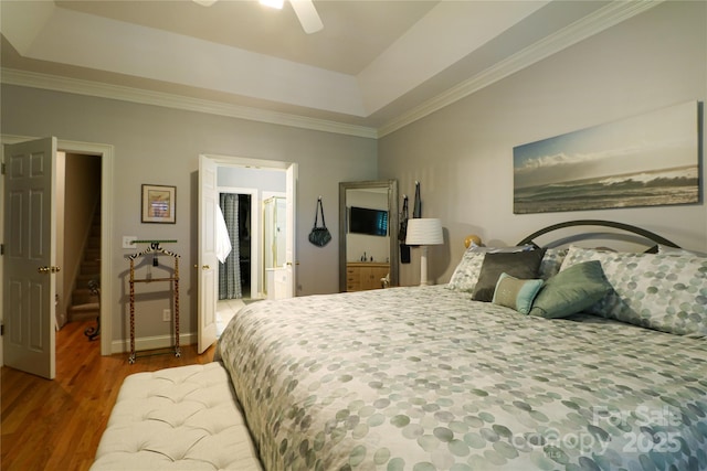 406 Spyglass Hill Pl, Salisbury, NC 28144 - bedroom with a raised ceiling, wood finished floors, crown molding, and ceiling fan
