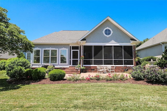 406 Spyglass Hill Pl, Salisbury, NC 28144 - rear view of house with a yard, a sunroom, stucco siding, and brick siding