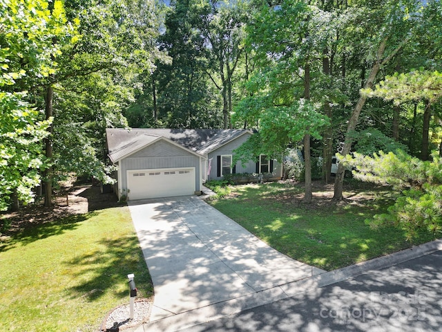 8416 Rittenhouse Cir, Charlotte, NC 28270 - view of front of house with an attached garage, concrete driveway, and a front yard