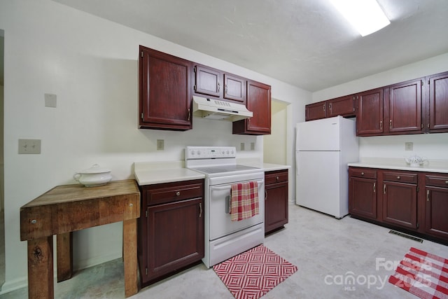 8416 Rittenhouse Cir, Charlotte, NC 28270 - kitchen featuring white appliances, under cabinet range hood, dark brown cabinets, and light floors