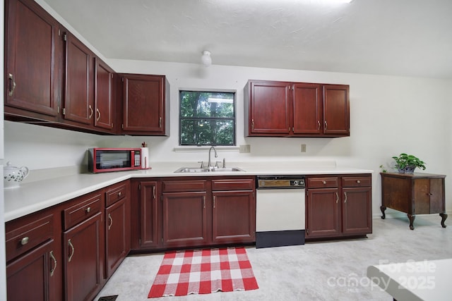 8416 Rittenhouse Cir, Charlotte, NC 28270 - kitchen with white dishwasher, light countertops, and dark brown cabinets