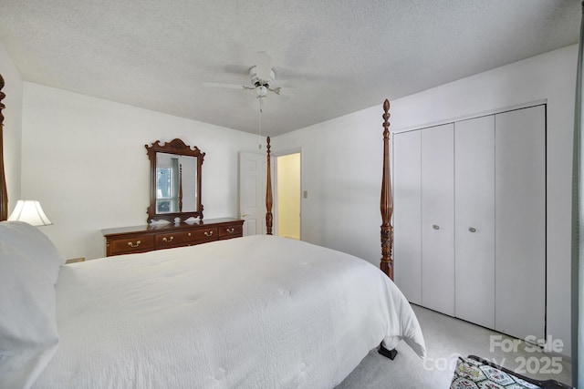 8416 Rittenhouse Cir, Charlotte, NC 28270 - bedroom with a closet, a ceiling fan, and light carpet