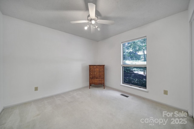 8416 Rittenhouse Cir, Charlotte, NC 28270 - carpeted empty room with ceiling fan