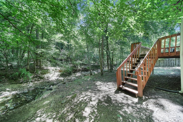 8416 Rittenhouse Cir, Charlotte, NC 28270 - view of yard featuring stairway and a wooden deck