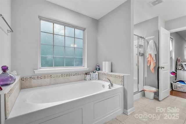 2953 Cameron Village Ct, Winston Salem, NC 27103 - full bathroom featuring a shower stall, a garden tub, and plenty of natural light