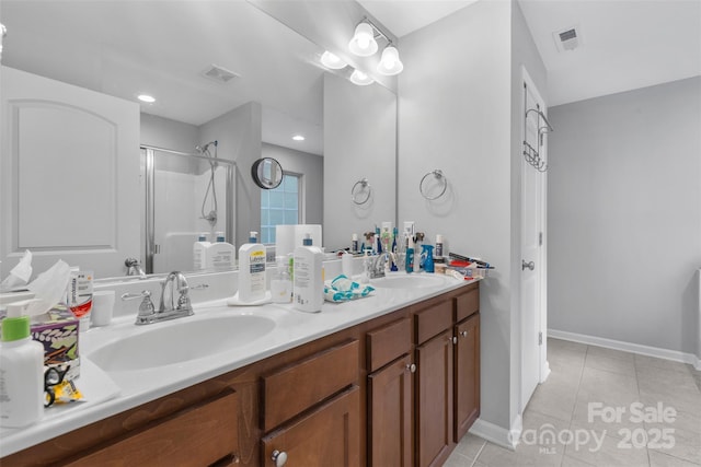 2953 Cameron Village Ct, Winston Salem, NC 27103 - full bath featuring double vanity, a stall shower, tile patterned flooring, and recessed lighting