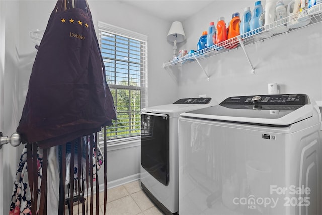 2953 Cameron Village Ct, Winston Salem, NC 27103 - washroom with washer and clothes dryer and light tile patterned floors
