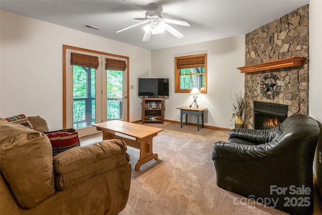 380 Allison Dr, Maggie Valley, NC 28751 - living room featuring healthy amount of natural light, light colored carpet, a fireplace, and ceiling fan