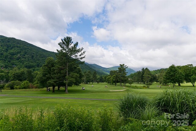 380 Allison Dr, Maggie Valley, NC 28751 - view of community with a mountain view, view of golf course, and a yard