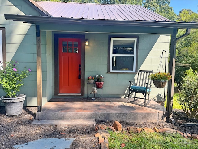 201 Barnes Ln, Stony Point, NC 28678 - property entrance with a porch and a metal roof