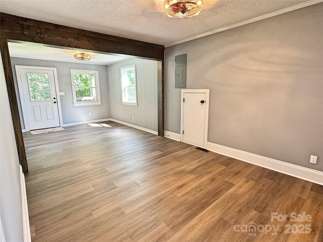 201 Barnes Ln, Stony Point, NC 28678 - entrance foyer featuring a textured ceiling, wood finished floors, and electric panel