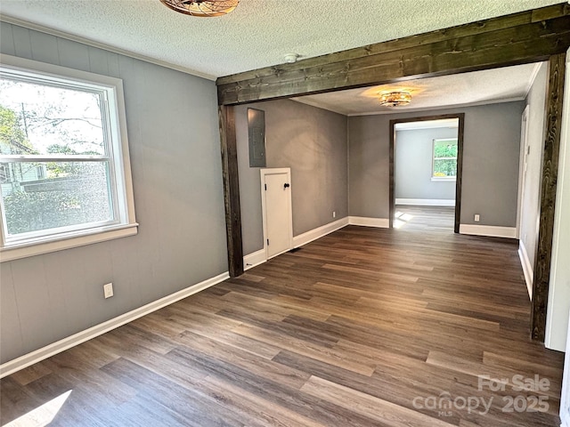 201 Barnes Ln, Stony Point, NC 28678 - spare room with a textured ceiling, wood finished floors, and wood walls