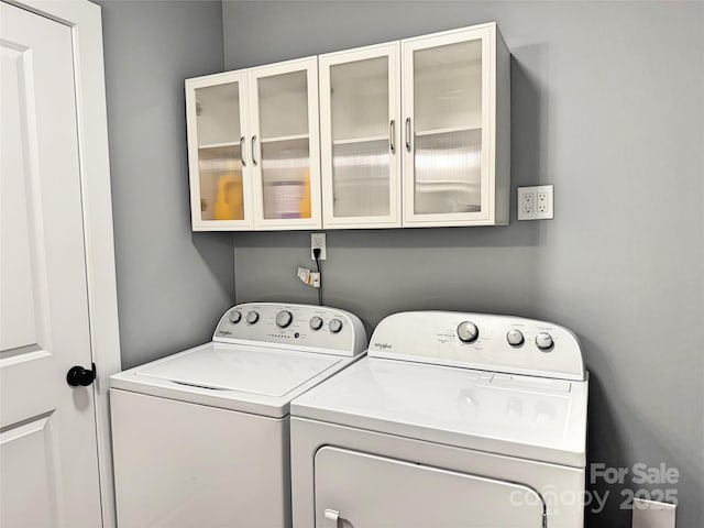 201 Barnes Ln, Stony Point, NC 28678 - laundry area featuring washing machine and dryer and cabinet space