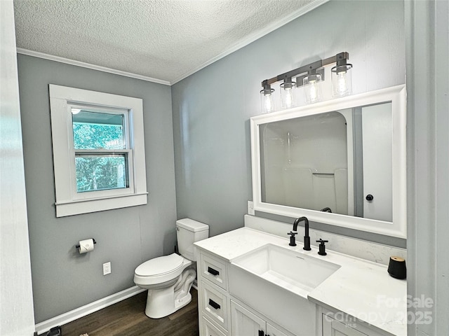 201 Barnes Ln, Stony Point, NC 28678 - bathroom with a textured ceiling, wood finished floors, vanity, crown molding, and a shower