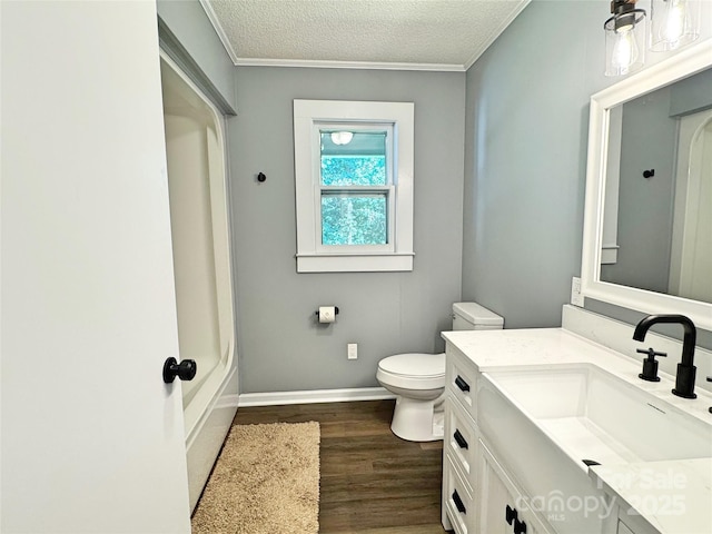 201 Barnes Ln, Stony Point, NC 28678 - full bath with vanity, wood finished floors, a textured ceiling, and ornamental molding