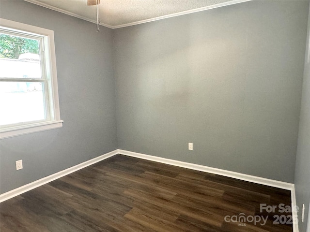 201 Barnes Ln, Stony Point, NC 28678 - unfurnished room featuring dark wood-type flooring, ornamental molding, and ceiling fan