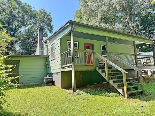 201 Barnes Ln, Stony Point, NC 28678 - view of front facade featuring stairs, a front yard, a chimney, and a porch