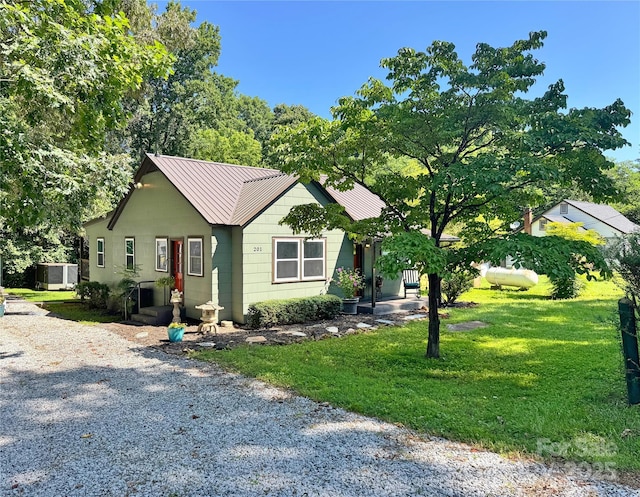 201 Barnes Ln, Stony Point, NC 28678 - view of front facade featuring a front lawn and a metal roof