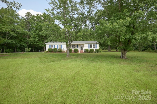 7645 Robinson Church Rd, Harrisburg, NC 28075 - single story home featuring a front yard