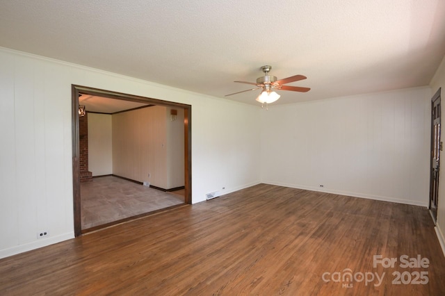 7645 Robinson Church Rd, Harrisburg, NC 28075 - unfurnished room featuring ceiling fan and wood finished floors