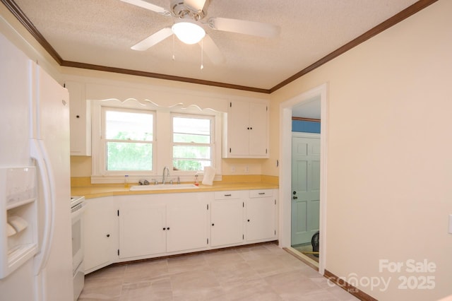 7645 Robinson Church Rd, Harrisburg, NC 28075 - kitchen featuring white refrigerator with ice dispenser, crown molding, range, a textured ceiling, and white cabinets