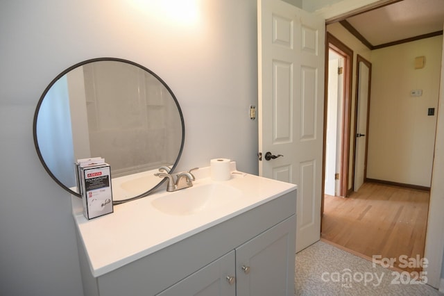7645 Robinson Church Rd, Harrisburg, NC 28075 - bathroom with vanity and wood finished floors