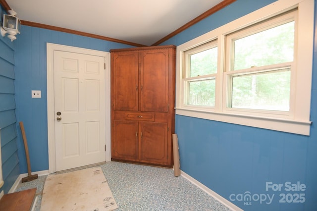 7645 Robinson Church Rd, Harrisburg, NC 28075 - doorway with baseboards and crown molding