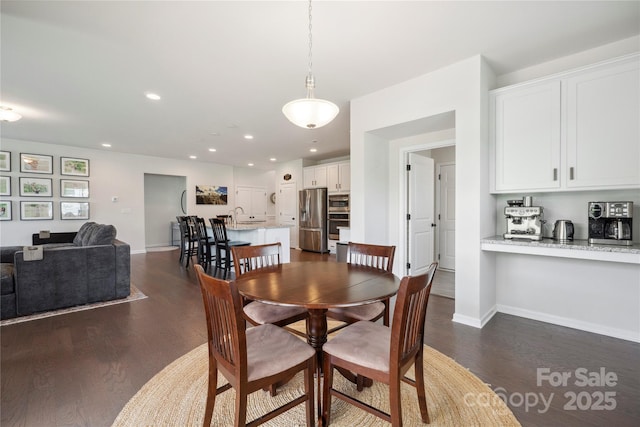 13339 Mcguffy Dr, Huntersville, NC 28078 - dining area featuring dark wood finished floors and recessed lighting
