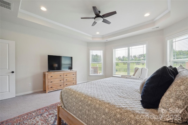 13339 Mcguffy Dr, Huntersville, NC 28078 - carpeted bedroom featuring a raised ceiling, ornamental molding, recessed lighting, and a ceiling fan