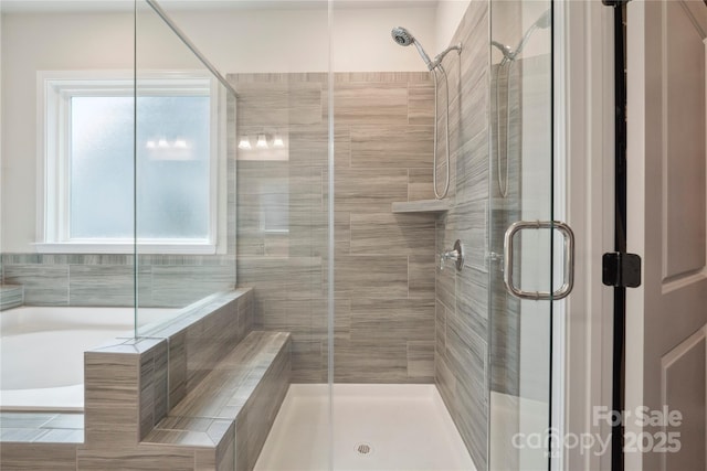 13339 Mcguffy Dr, Huntersville, NC 28078 - full bath featuring a shower stall and a relaxing tiled tub