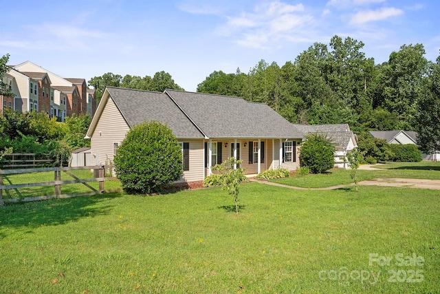 121 Gilcrest Ln, Troutman, NC 28166 - view of front facade featuring a storage shed and a shingled roof