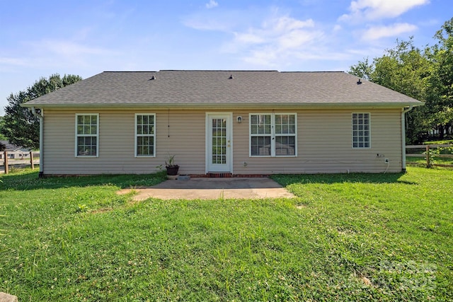 121 Gilcrest Ln, Troutman, NC 28166 - rear view of property featuring a patio area and a shingled roof